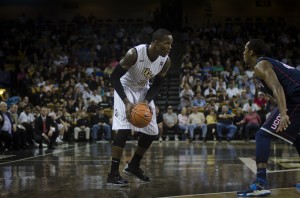 Isaiah Sykes looks to drive the ball. 