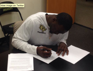 Johnson tweeted out an image of his signing on Tuesday. 