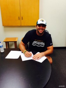 Bortles signs his rookie deal on Wednesday. Photo: Jaguars.com. 