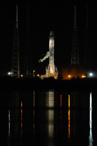 The SpaceX Dragon sits on the Falon 9 rocket awaiting launch for the International Space Station, early Tuesday morning. An actuator issue aborted the day's launch. Photo by Nick Russett.