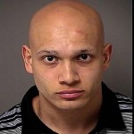 Alejandro Najera was arrested and charged with Attempted Armed Robbery, Aggravated Assault with Intent to Commit a Felony, Criminal Conspiracy and Driving Without a License.