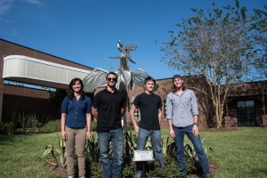 Mechanical Engineering Majors, in order from left to right: Jennifer Ambrosa, Chad Robinson, Cullen Fitzgerald, and Anthony Defilippo, stand in front of the newly repaired Pegasus Sculpture, on September 22nd, 2015. 