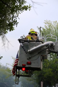 Firefighters had to get an aerial view of the third floor of the apartment building because the severely damaged building was unsafe to enter. Photo by Katrina Poggio.