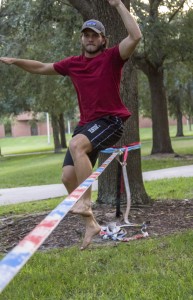 UCF Knight working on his tricks on the slackline. Photo by Chelsea Santiago.