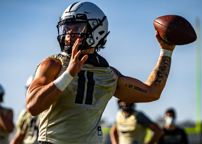 UCF sophomore quarterback Dillon Gabriel (11) throws the ball during the team's first practice this spring on March 15, 2021. Photo courtesy of UCF Athletics.