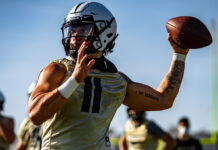UCF sophomore quarterback Dillon Gabriel (11) throws the ball during the team's first practice this spring on March 15, 2021. Photo courtesy of UCF Athletics.